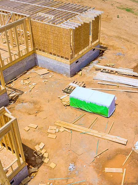 dumping trash wood drywall roofing construction